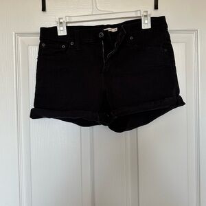Black mid length Levi shorts
